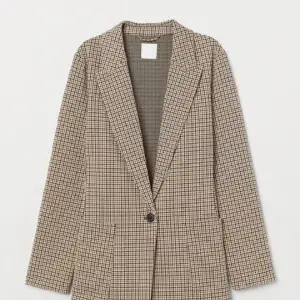 Hundtandsmönstrad blazer från H&M