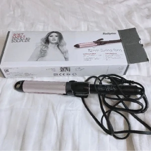 Locktång  - En jätte nice locktång som kanppt är använd då jag inye förstår hur man ska kunna locka med en sån, grejen som gör att den står upp är trasig men inget som påverkar locktång ❤️