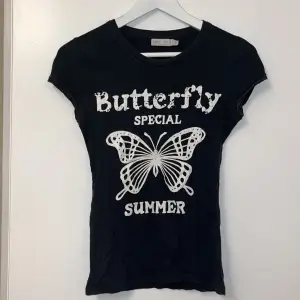 Sjukt snygg butterfly T-shirt. 