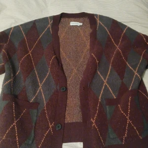 multicoloured cardigan - worn a few times but still in good condition, extra button in pocket