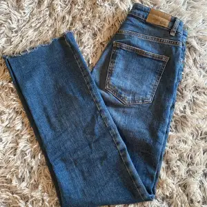 Jeans i modell straight