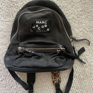 Marc Jacobs backpack - In good condition, cute leopard detail, very spacey and stylish.