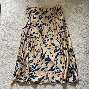 Satinkjol - Satinkjol med mönster i nytt skick