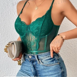 Body - Oanvänd body. Skulle ha den på 100 dagars men blev inte av. Strl M. 