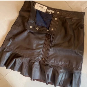 Snygg Ganni skinnkjol - Ny Ganni skinnkjol