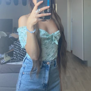 Bodysuit - En vacker blå bodysuit