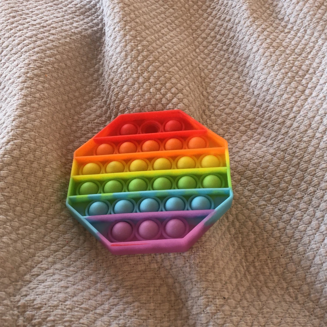 Regnbågig poppit - 90