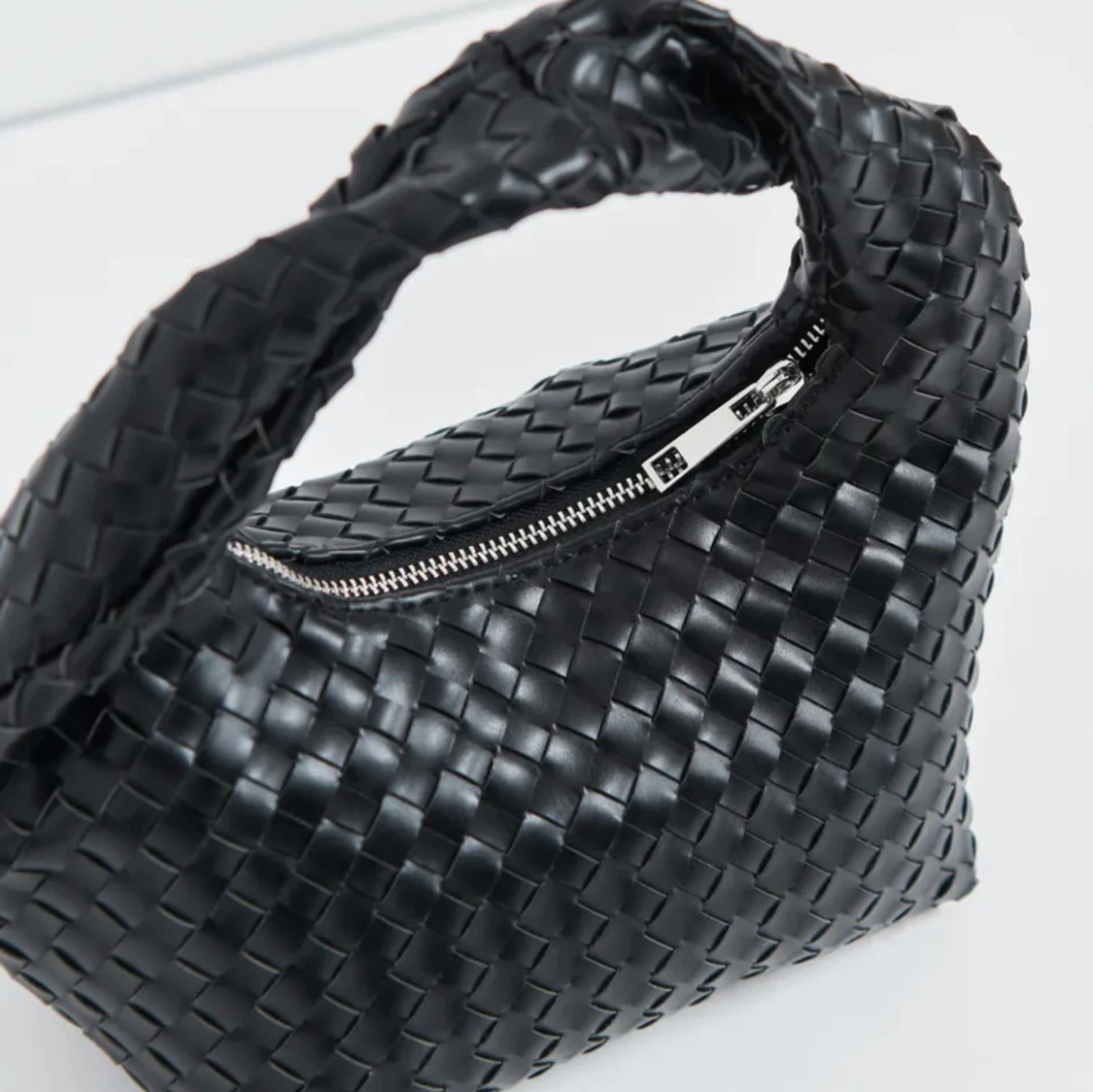 Flätad väska  - 90
