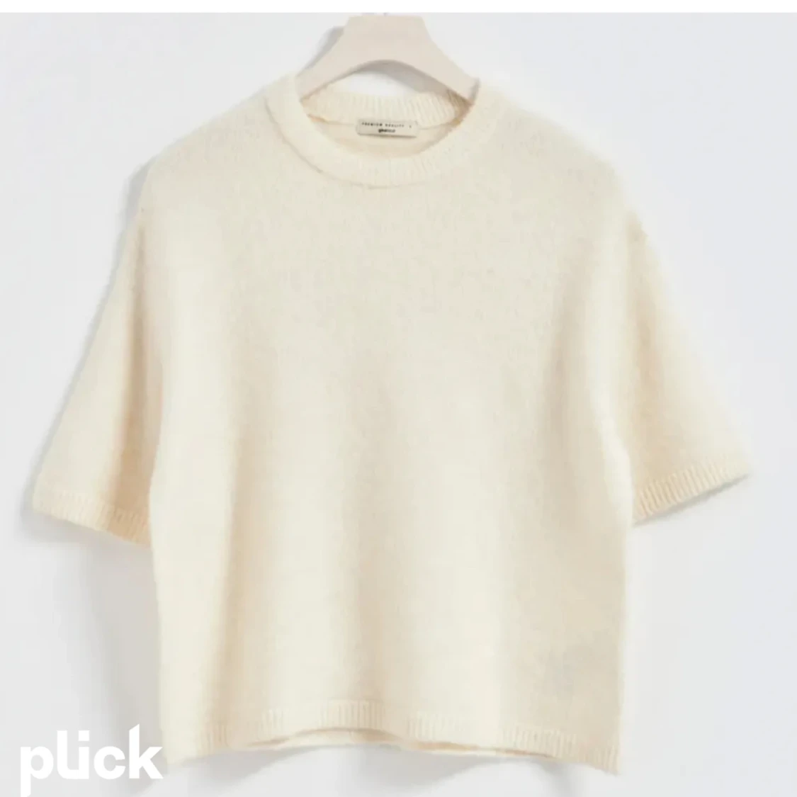 Fin stickad t-shirt från Gina tricot