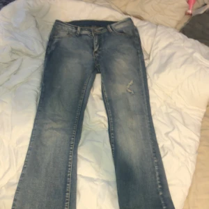 Lågmidjade bootcut jeans - Snygg blå färg