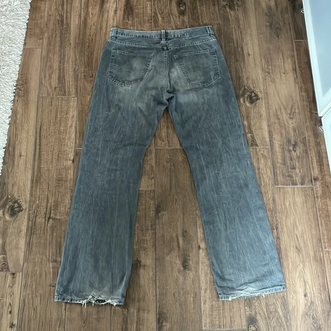 ljusgråa bootcut jeans  - 90