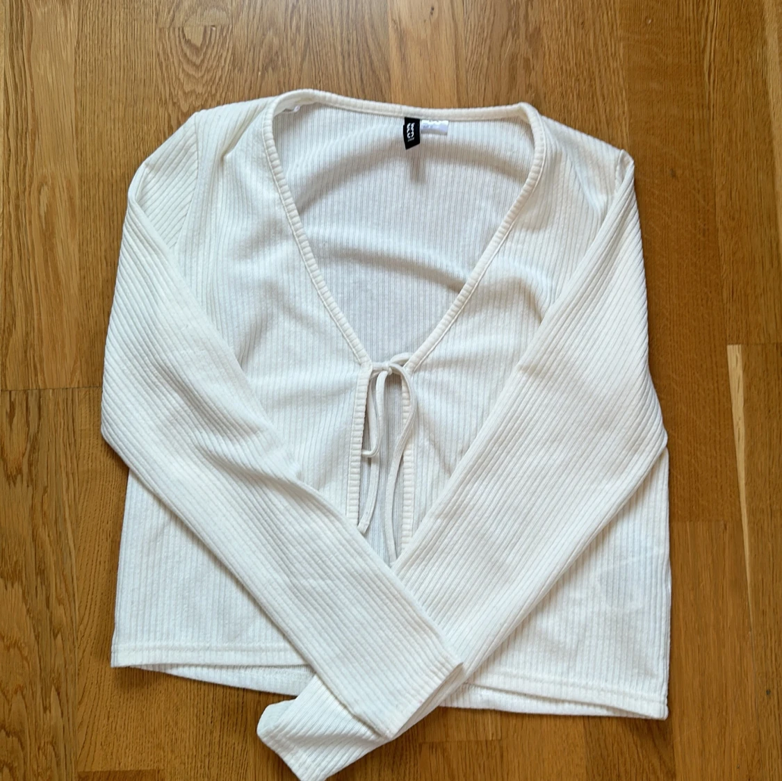 En vit kofta från HM