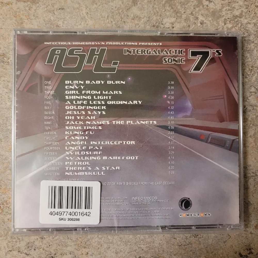 Ash intergalatic sonic 7 CD, den är oöppnad och fortfarande inslagen i sin originalplast. Övrigt.