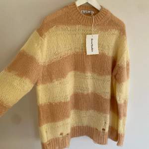 Sample of the classic Kurt Cobain-inspired Acne Studios knit. Distressed details, oversized fit. New with tags. Sample color of this style, not many out there. Fits M-L.