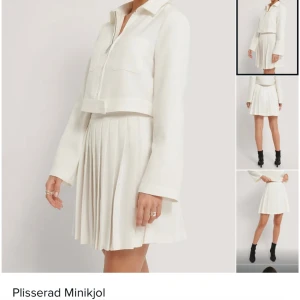 Vit kjol - Plisserad minikjol från NAKD Använd 1 gång  