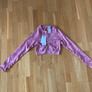 Träningstopp - Träningstopp från Gymshark. Helt oanvänd.