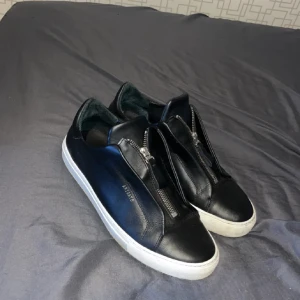 Axel arigato skor - Bra shock storlek 42