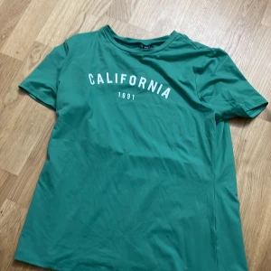 Grön T-shirt  - Inte använd en enda gång 