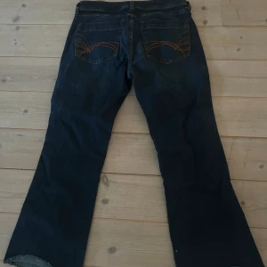 Lågmidajde mörka jeans - Lågmidjade mörka jeans