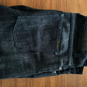 Nudie Jeans Grim Tim 34 W 34 L - Använda 2 gånger. 34/34