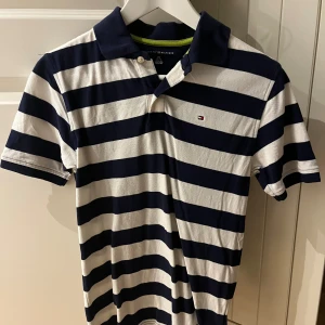 Tommy hilfiger piké - Aldrig använd  Skick: 10/10 Xs-s Pris kan diskuteras 