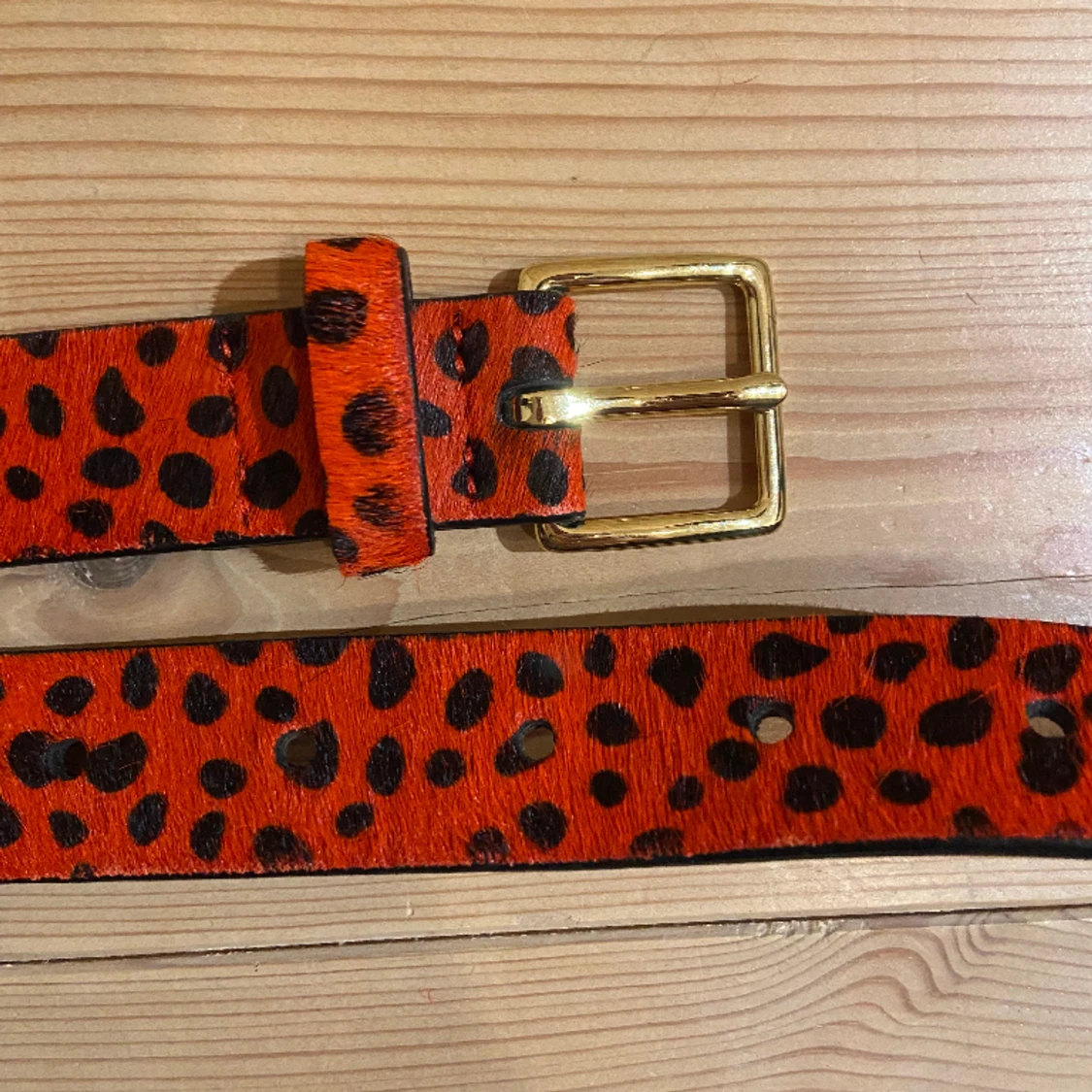 Rött leopard skärp