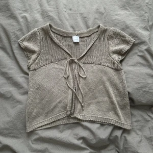 Kort kofta / bolero - Beige kofta / bolero