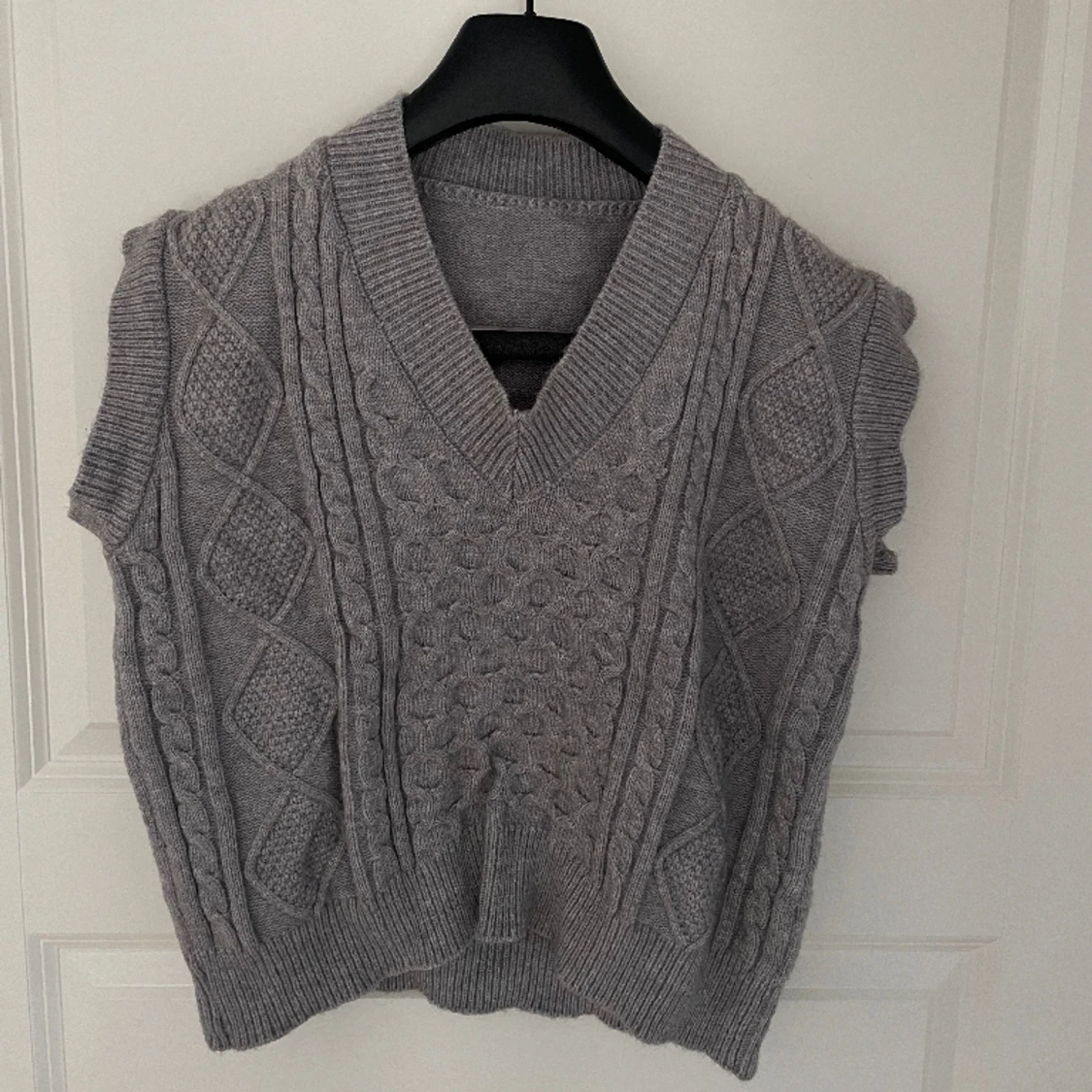 Stickad pullover / väst