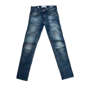 Replay jeans - Replay jeans i model anbass slimfit i bra skick som är i storlek 27/30