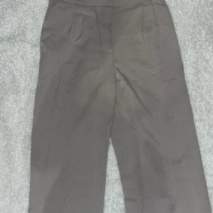 Beiga kostymbyxor  - Storlek 40