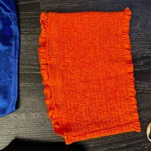 Kort topp orange  - Xs/s stretch aldrig använd. 