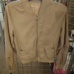 Jacka  - Bomber jacka beige 