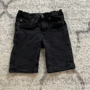 Selling black jeans shorts.