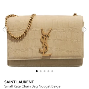 Ysl väska - Jag säljer min beiga ysl väska i modellen smal kate chain bag den är i fint skick men använd. Jag köpte väskan på plick för 5000 men jag säljer för 1500, pris kan diskuteras. Jag säljer då den inte kommer till användning men väskan är jätte fin 
