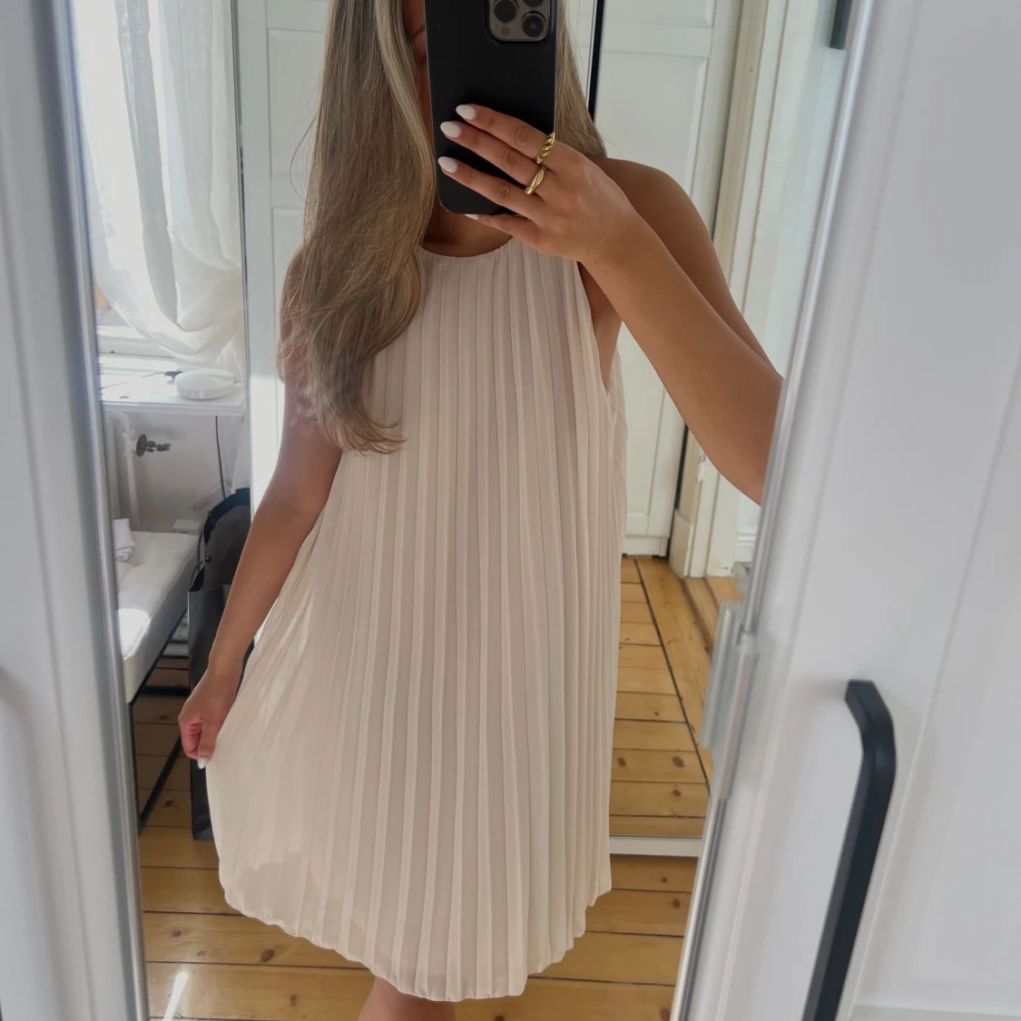 Plisserad klänning
