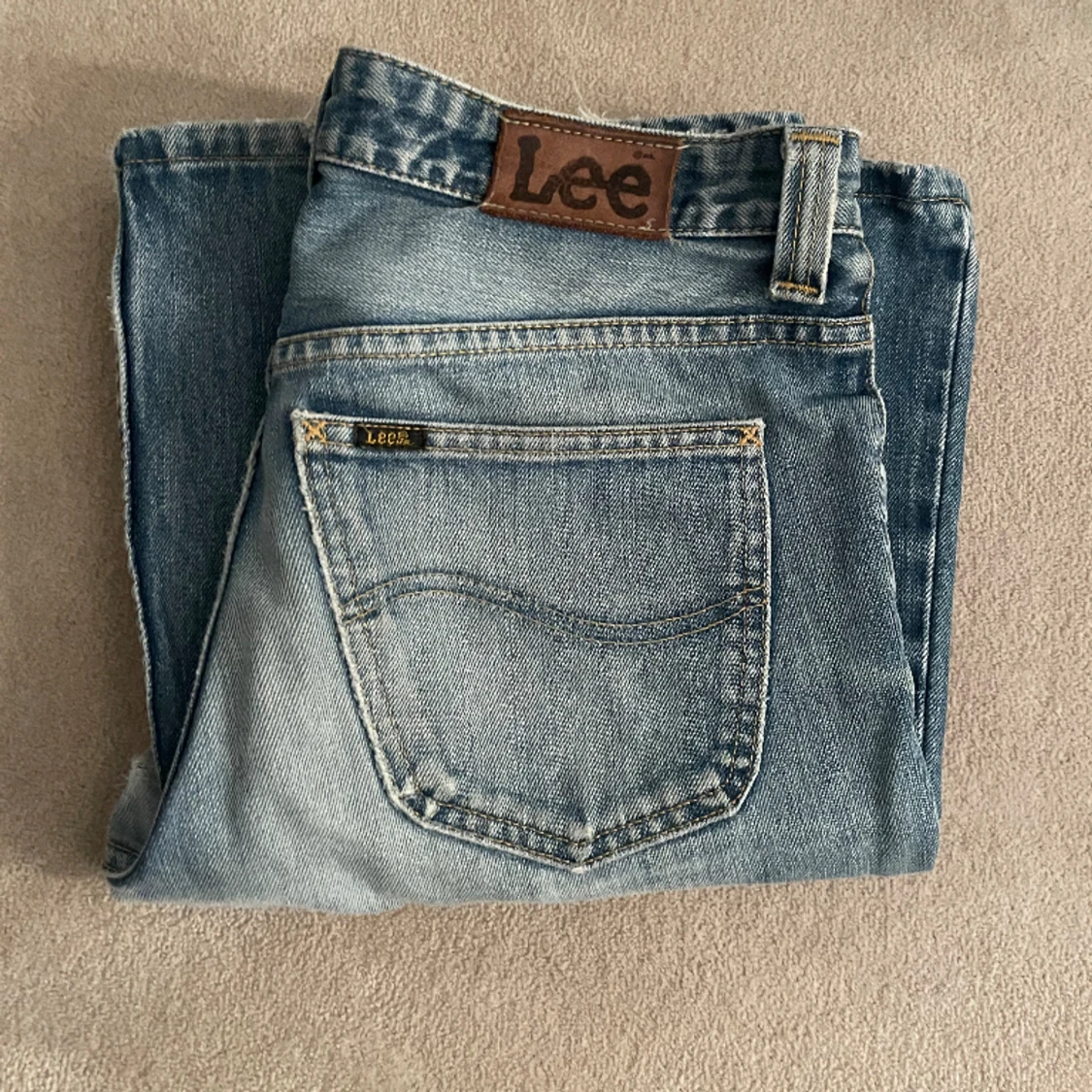lågmidjade lee jeans - 90