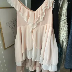 Aprikos/ rosa klänning 