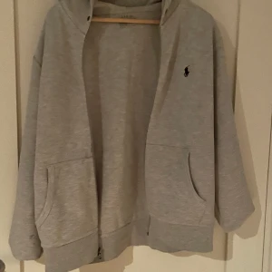 Raffe zip upp - Raffe 