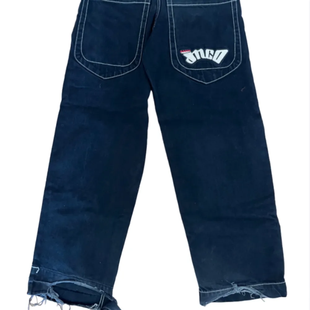 Ett par baggy JNCO jeans med skater stil. Lite trasiga nere vid fötterna men annars helt perfekta.. Jeans & Byxor.