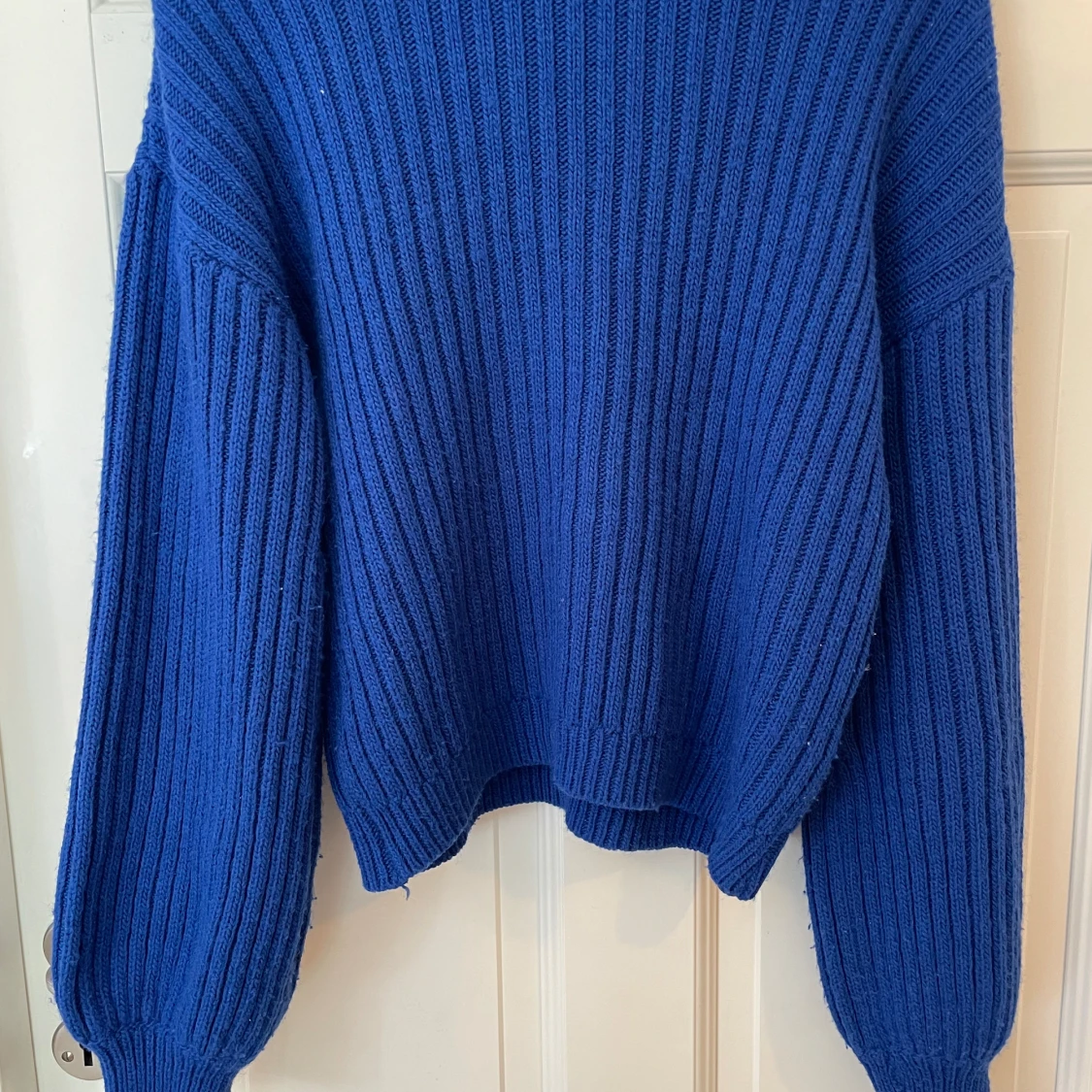 Blå stickad tröja - 90