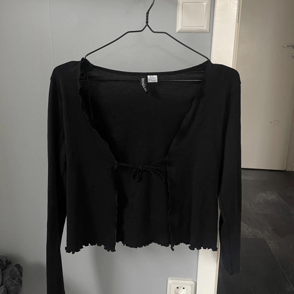 Svart kofta med knyt - 90