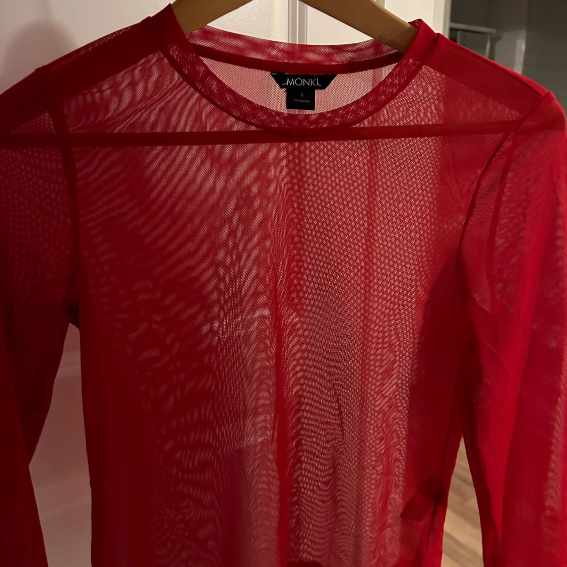 Tröja i röd mesh