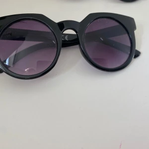 Solglasögon  - Knappt använda 