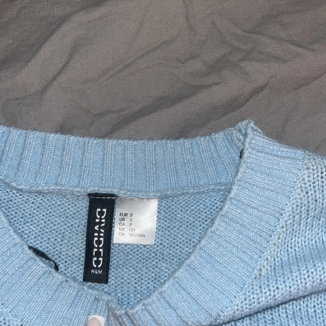 Blå stickad tröja - 90