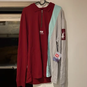 Helly hansen piké  - Helly hansen piké, helt ny, storlek XL, passar L också.