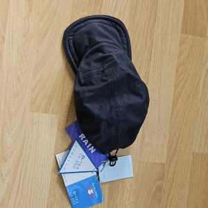 Keps Rain Wear - En oanvänd lite annorlunda keps från Daily sport - Rain Wear