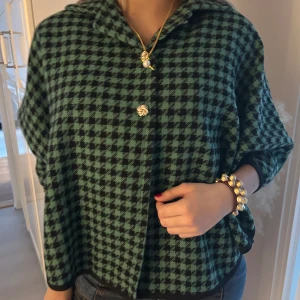 Poncho jacka - Mönstrad poncho jacka