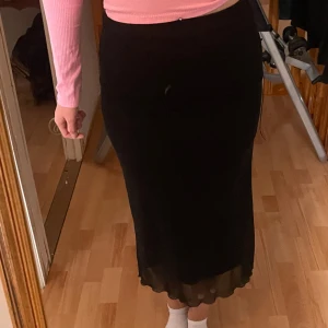 Svart långkjol - Storlek S. Oanvänd