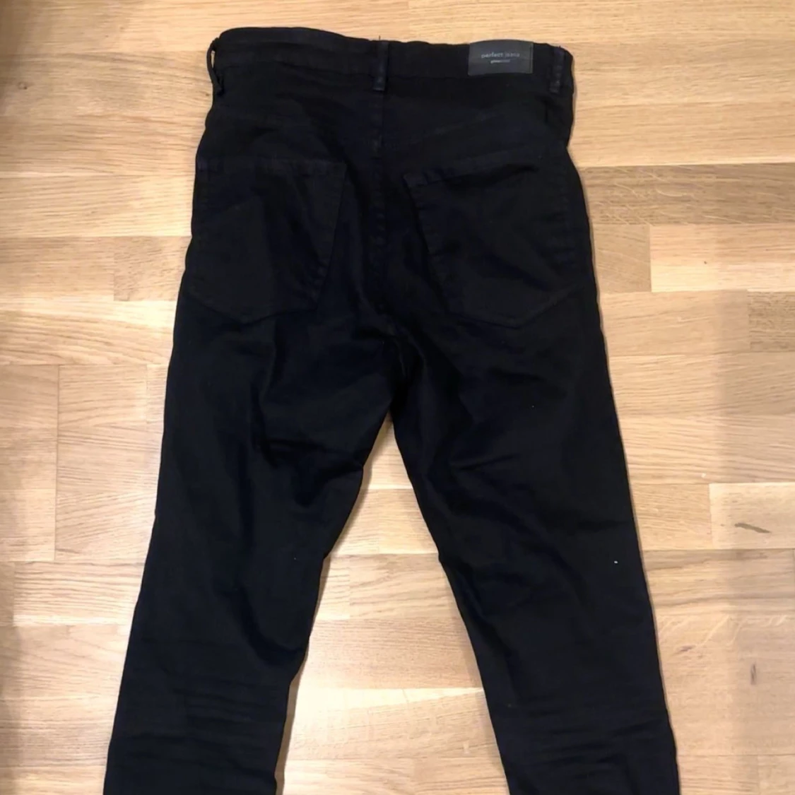 Svarta jeansbyxor - 90