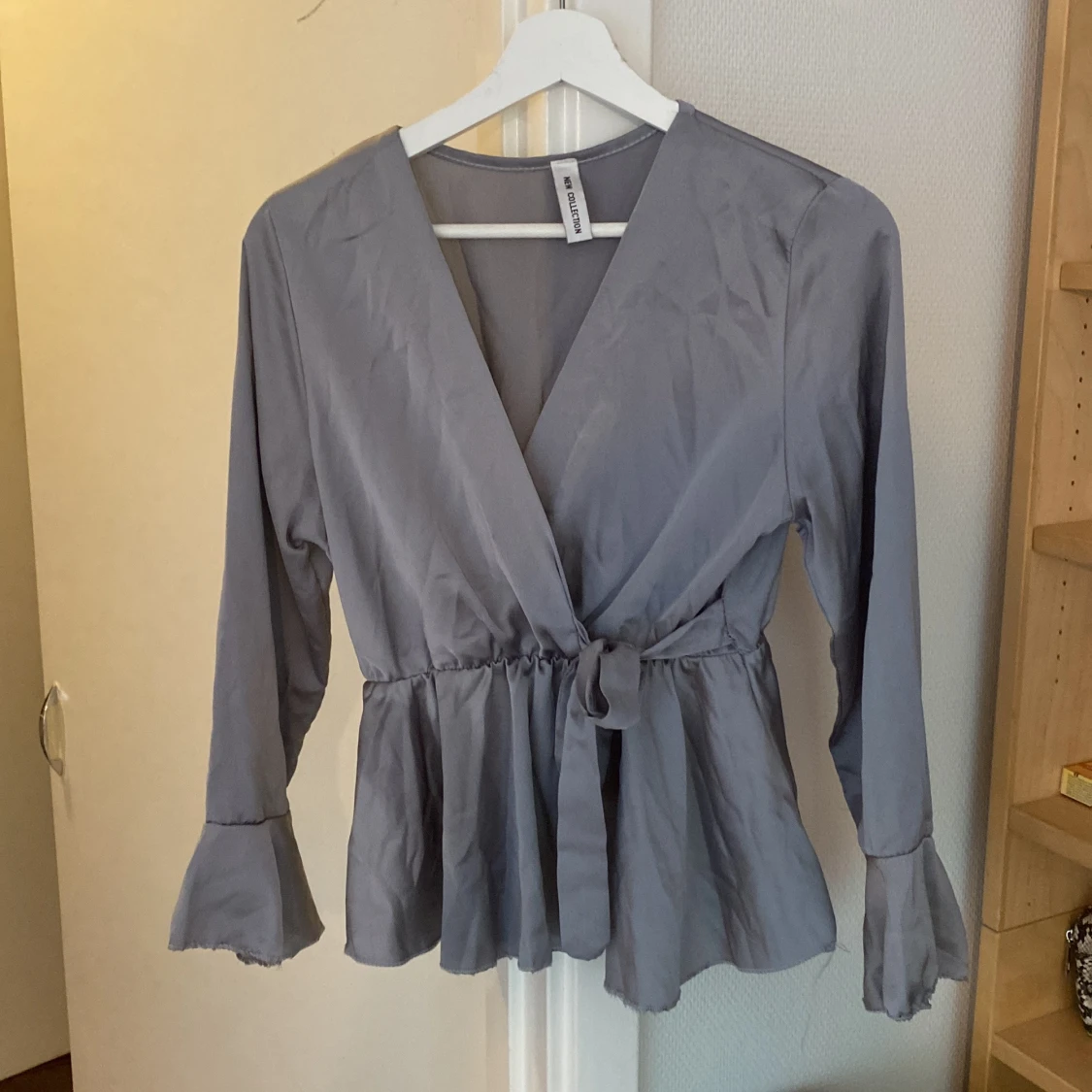 Vit blusar från ”New Collection”